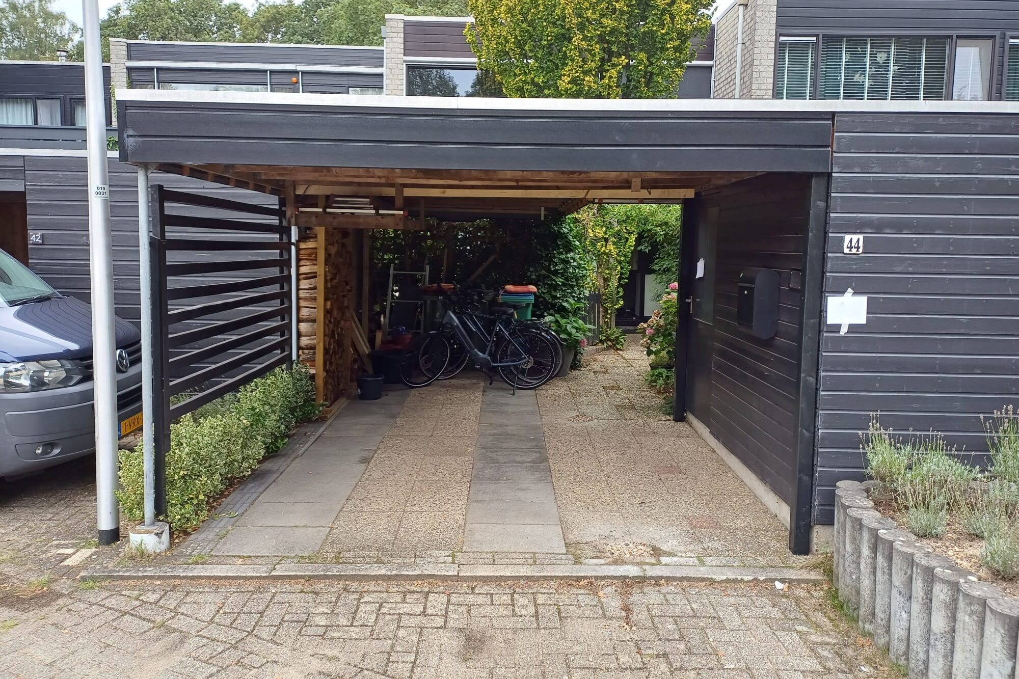 Carport versteviging om tussenpalen te kunnen verwijderen voor betere doorgang